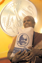 http://nkashokbharan.files.wordpress.com/2009/06/one-rupee-rice.jpg